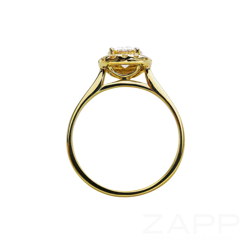 Ring aus 585 Gelbgold mit großem Brillanten und kleinen Brillanten