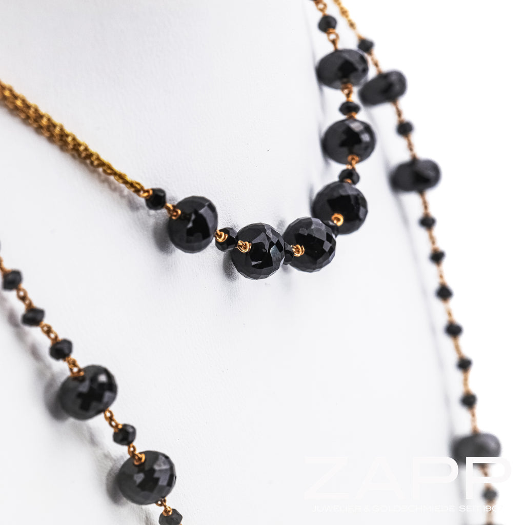 Collier aus 750 Roségold besetzt mit facettiertem Onix