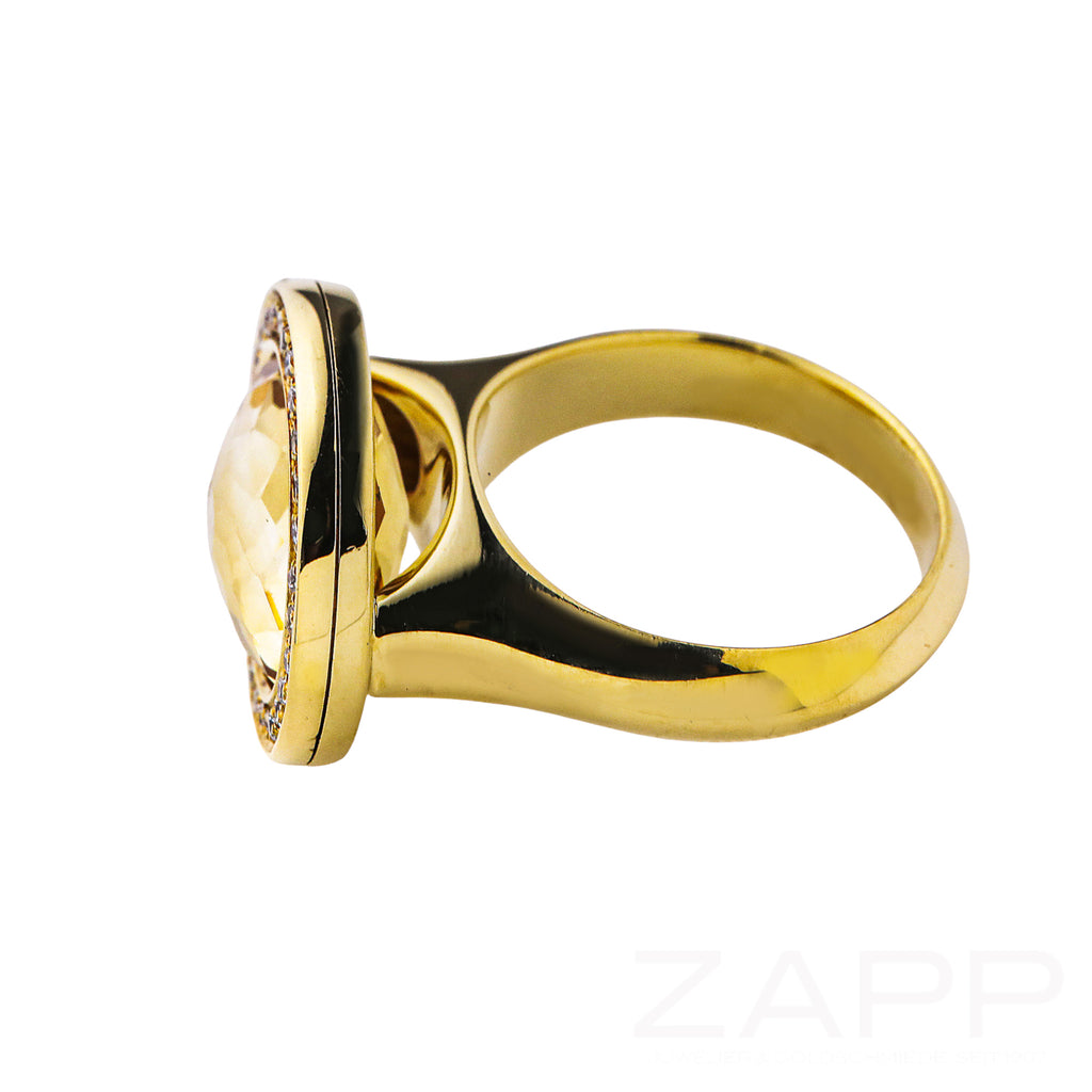 Ring aus 750 Gelbgold mit mit kleinen Brillanten und facettiertem Citrin