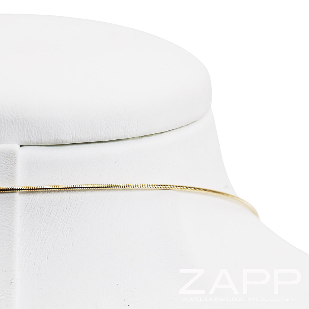 Jörg Heinz Halsreif mit Bajonettvorrichtung aus 750 Gelbgold und Stahl